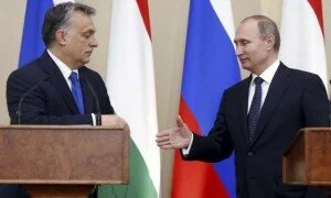 Russian President Vladimir Putin (R) and Hungarian Prime Minister Viktor Orban shake hands during a joint news conference following their talks at the Novo-Ogaryovo state residence outside Moscow, Russia, February 17, 2016. REUTERS/Maxim Shipenkov